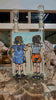 Two Kids Over The Fence